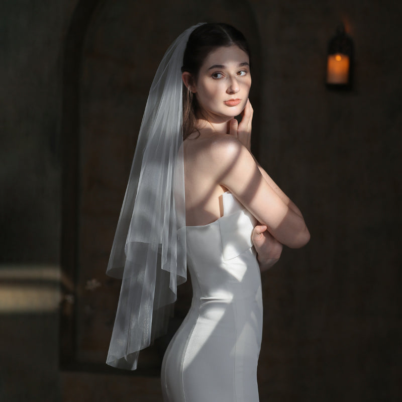 Classic lace bridal veil for elegant wedding attire0